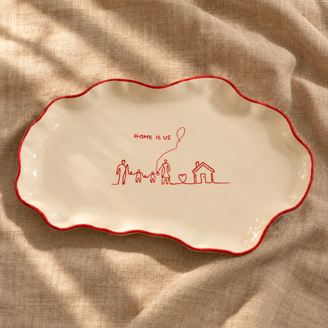 Red-rim platter on tan linen